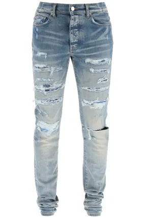 Amiri Logo Patch Ripped Slim Cut Jeans